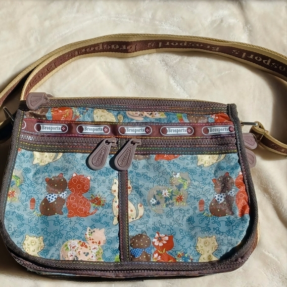 Brosports Handbags - Brosports lovable cats purse lots of pockets  zippers blue patchwork cat bag